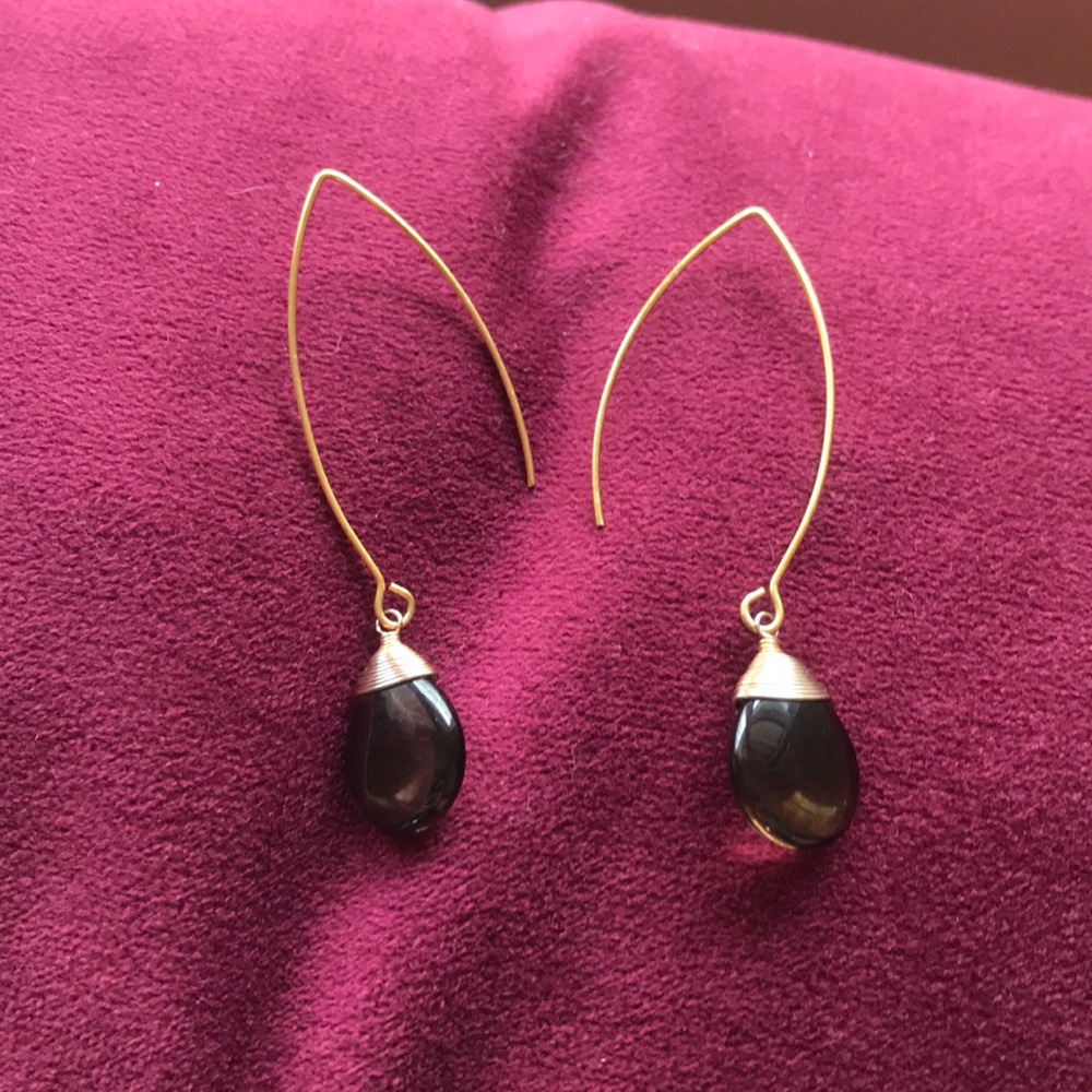 Gold hanging earrings with brown glass bead